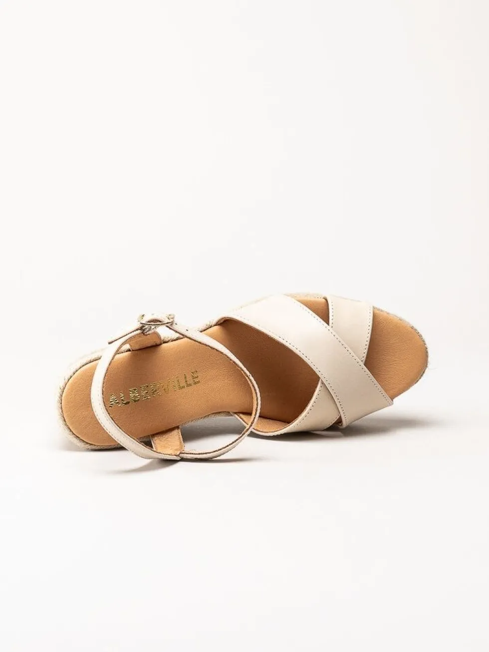 Alberville - Beige kilklackade sandaletter i skinn