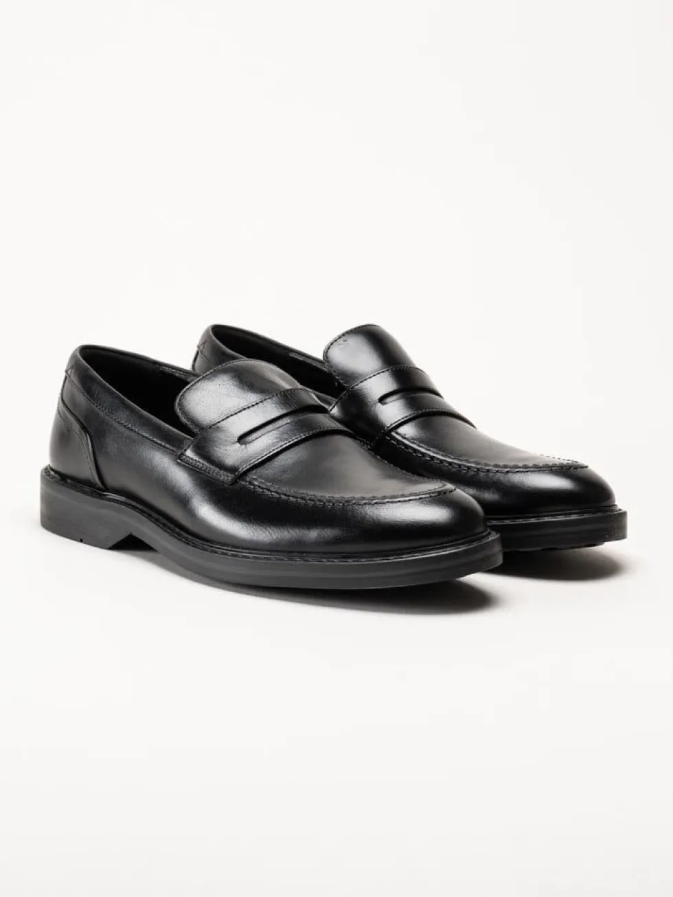 Clarks - Aldwin Step G - Svarta slip-on loafers i skinn