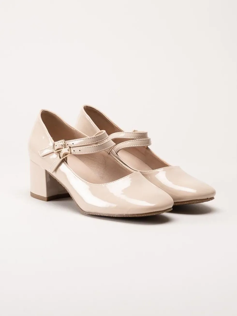 Duffy - Beige lackpumps med remmar
