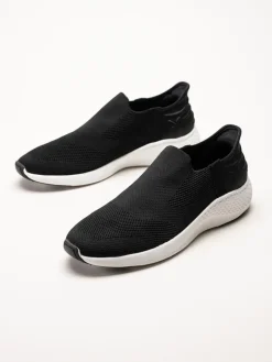 Exani - Ease M - Svarta slip on skor i textil