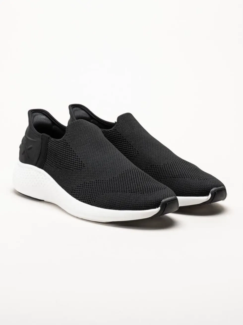 Exani - Ease M - Svarta slip on skor i textil