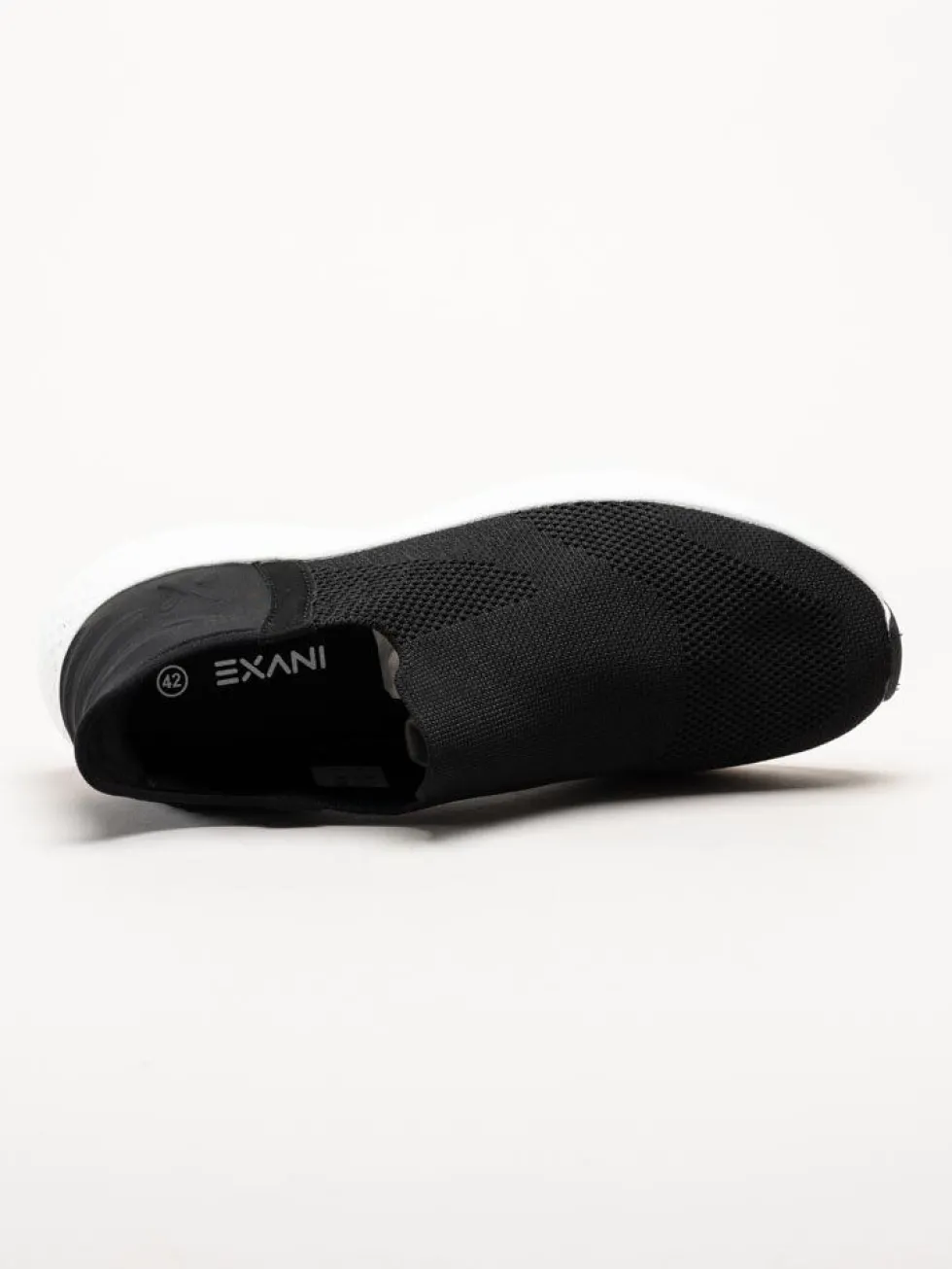 Exani - Ease M - Svarta slip on skor i textil