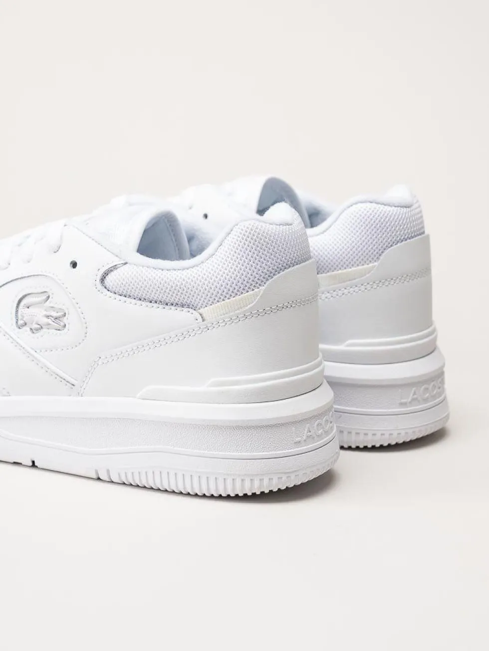 Lacoste - Vita sneakers i skinn