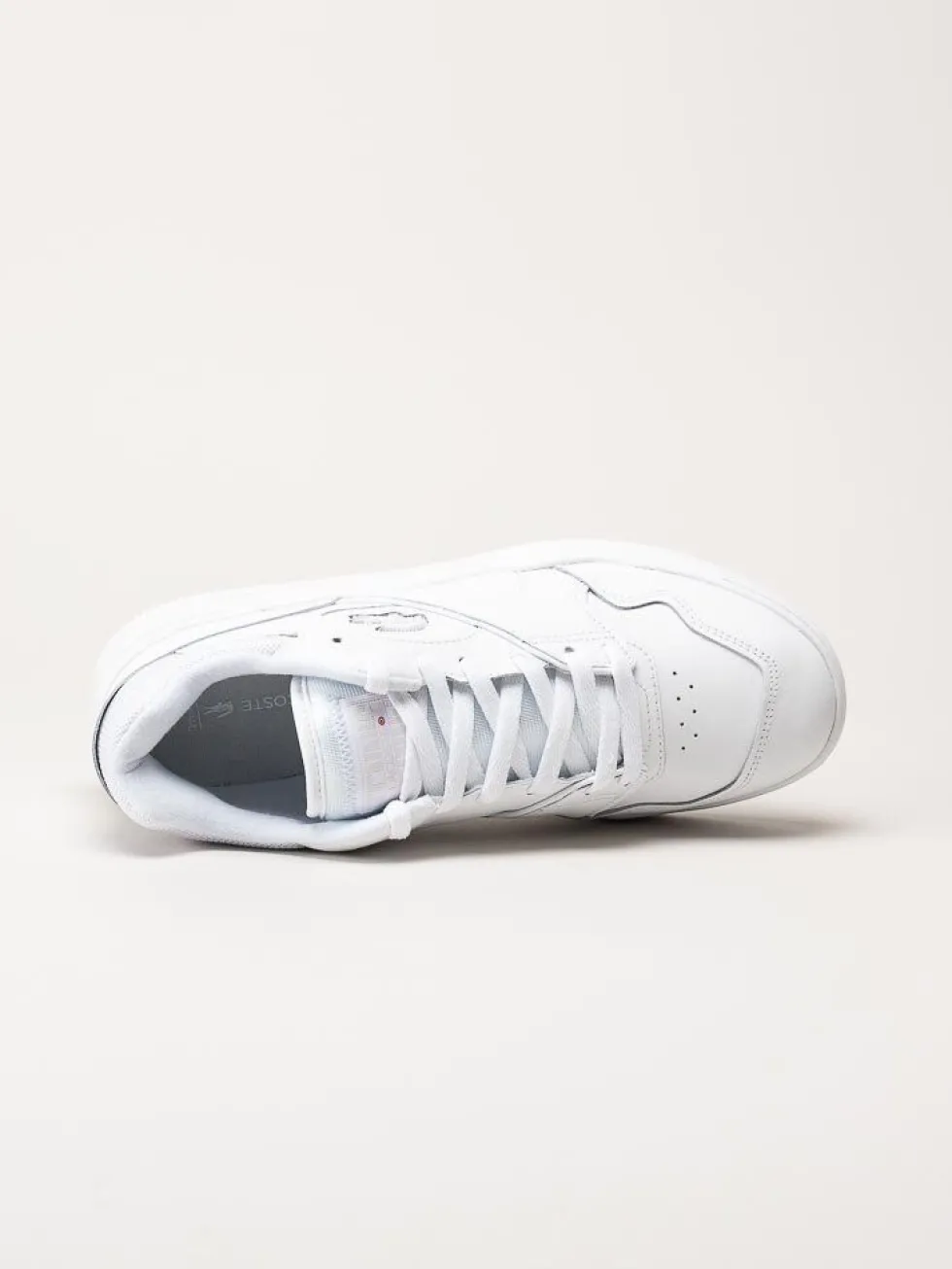 Lacoste - Vita sneakers i skinn