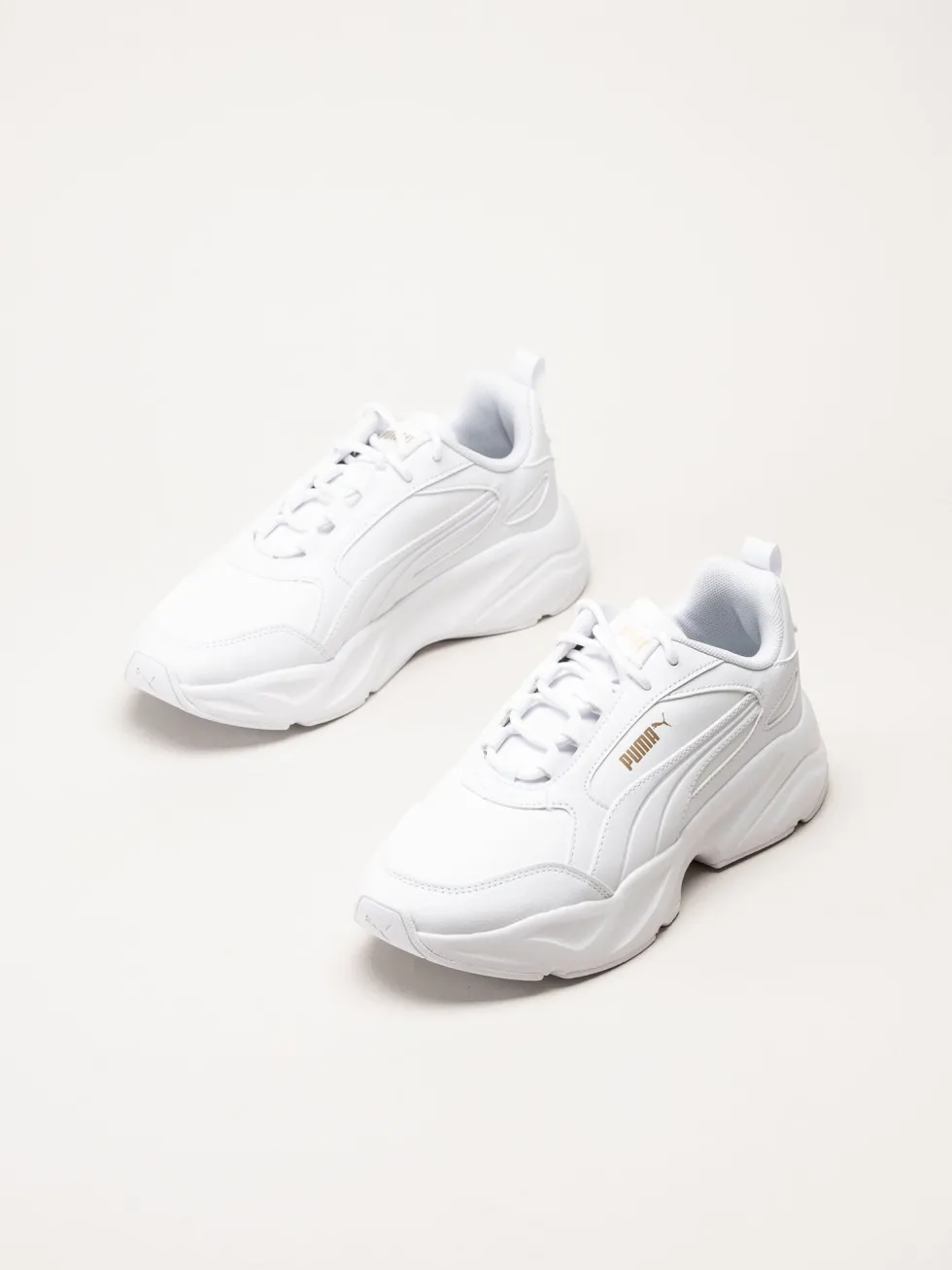 Puma - Cassia 2.0 - Vita sneakers i skinnimitation