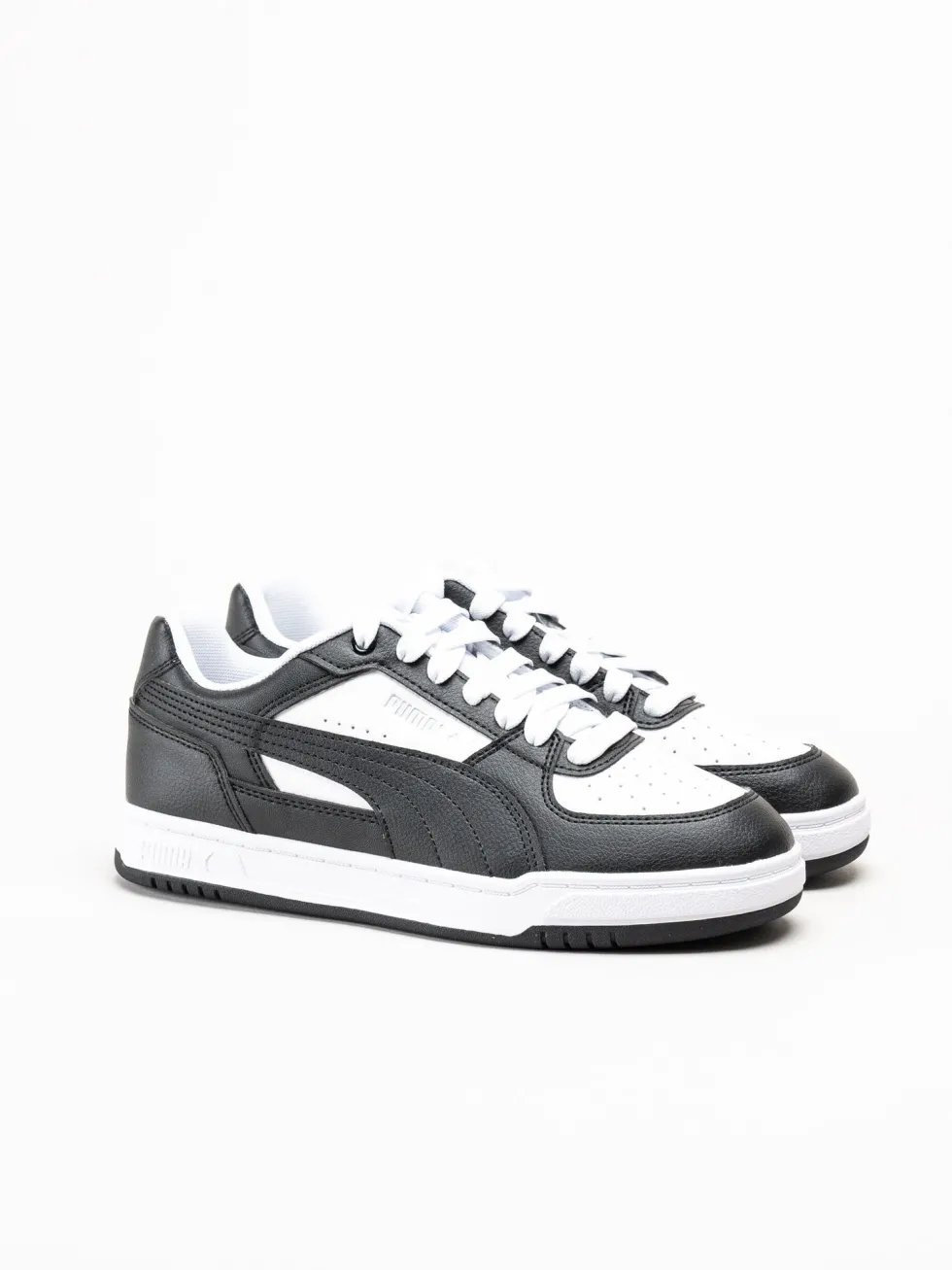 Puma - Caven III - Svartvita sneakers i skinnimitation