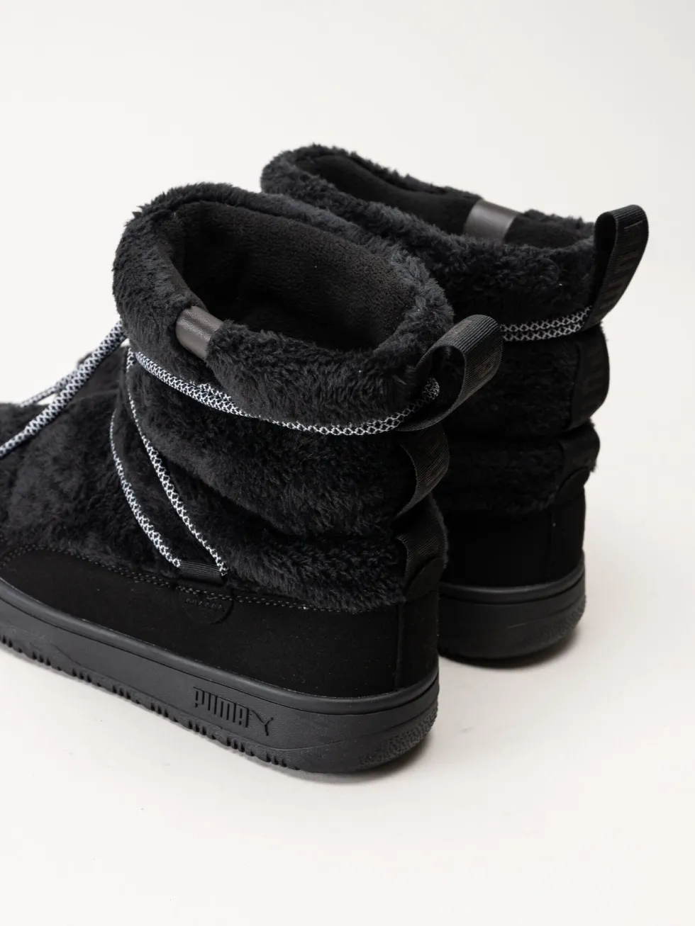 Puma - Snowbae Suede Wns - Svarta boots i fuskpäls