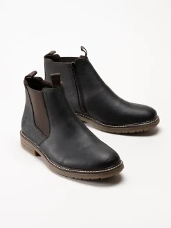 Rieker - Mörkbruna chelsea boots i oljat skinn