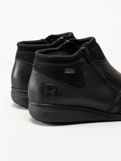 Rieker - Svarta boots i skinn och textil