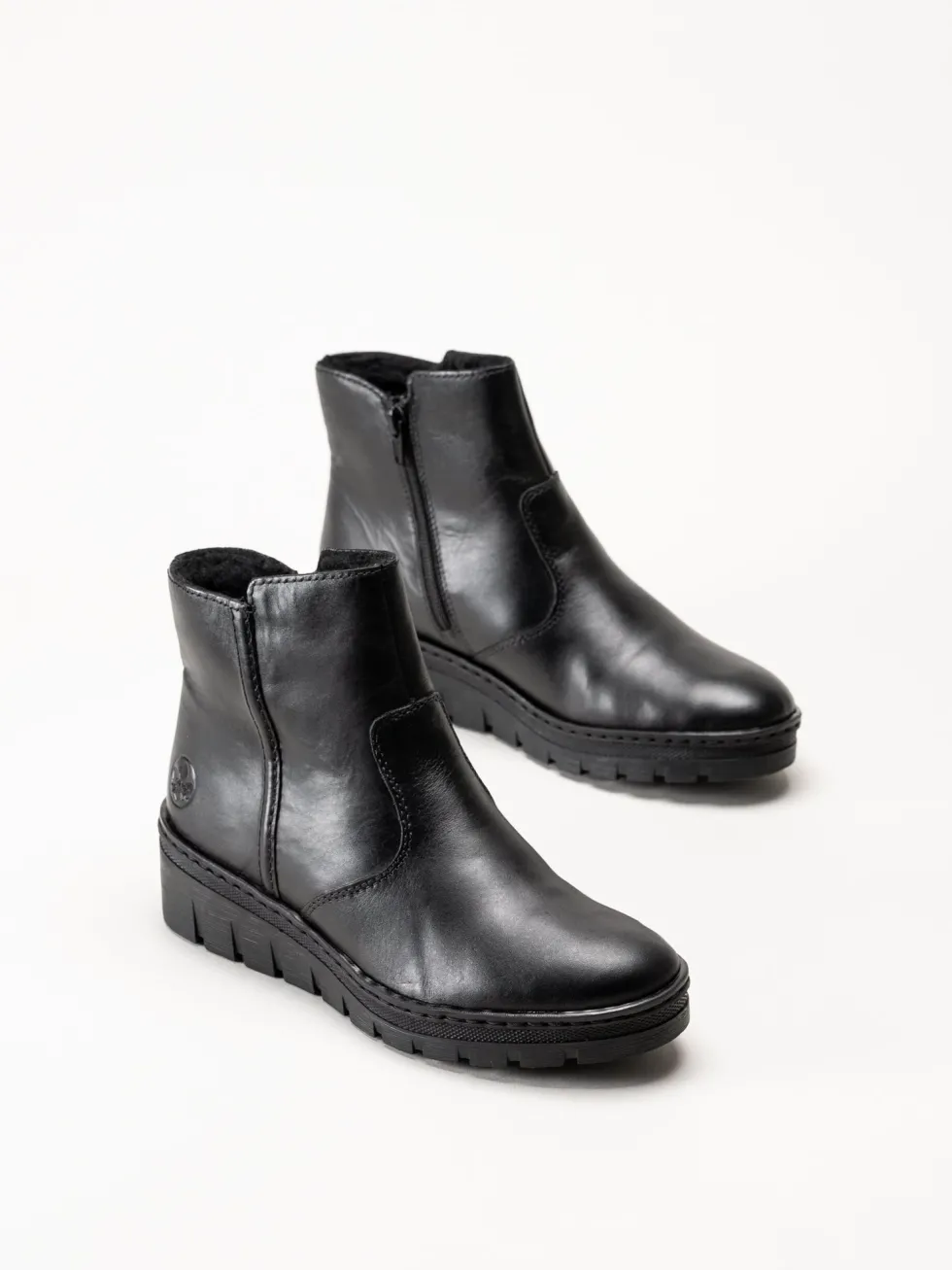 Rieker - Svarta fodrade kilklackade boots
