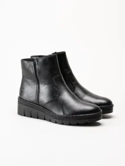 Rieker - Svarta fodrade kilklackade boots