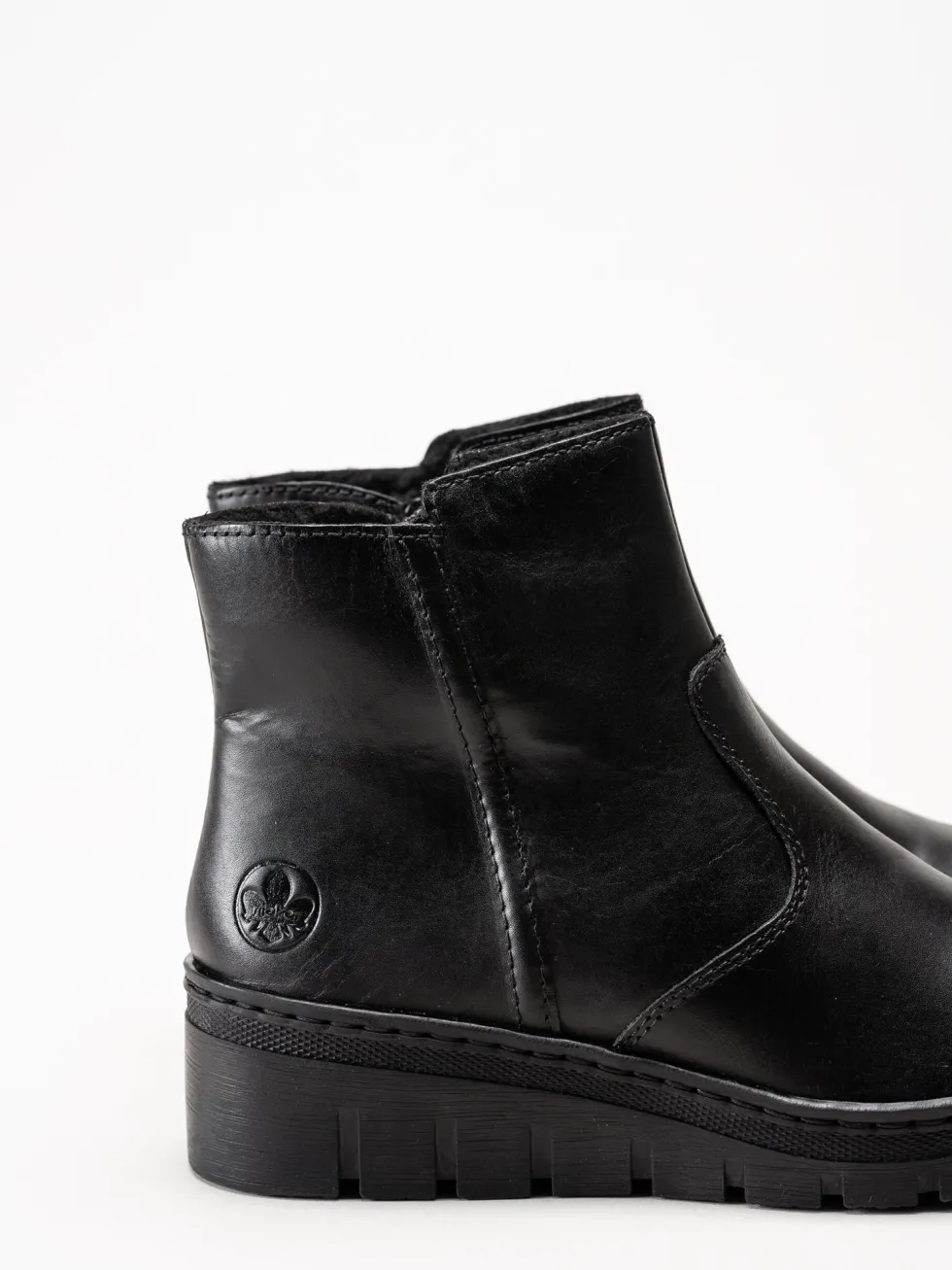 Rieker - Svarta fodrade kilklackade boots