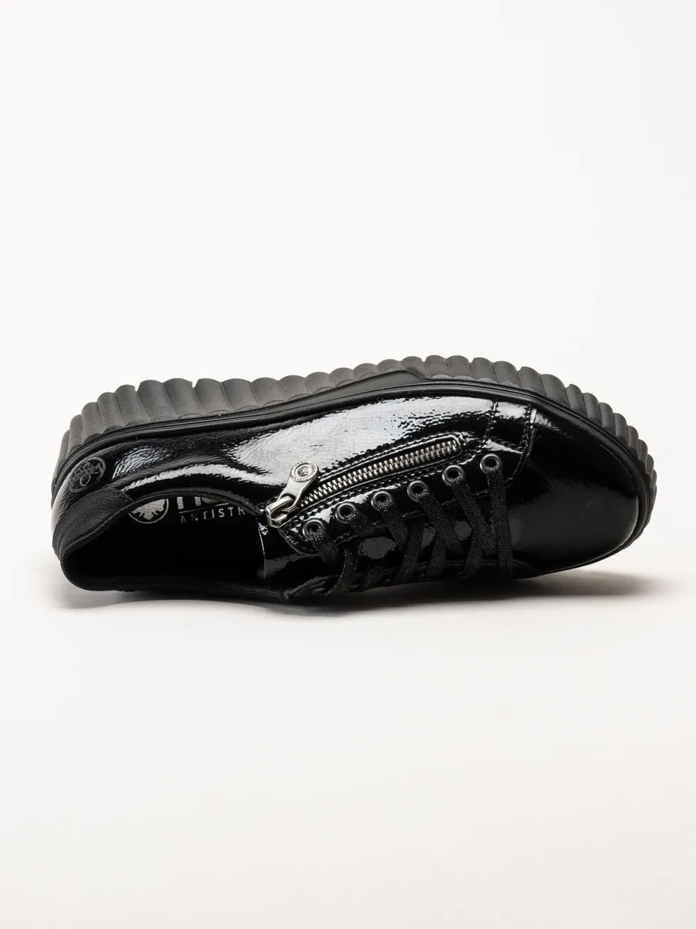 Rieker - Svarta platåsneakers i skinn-lack