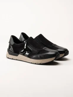 Rieker - Svarta promenadsneakers i nubuck och skinn