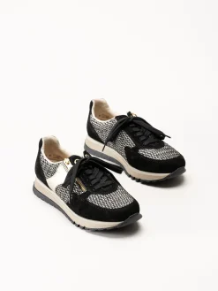 Rieker - Svarta sneakers i mocka och textil
