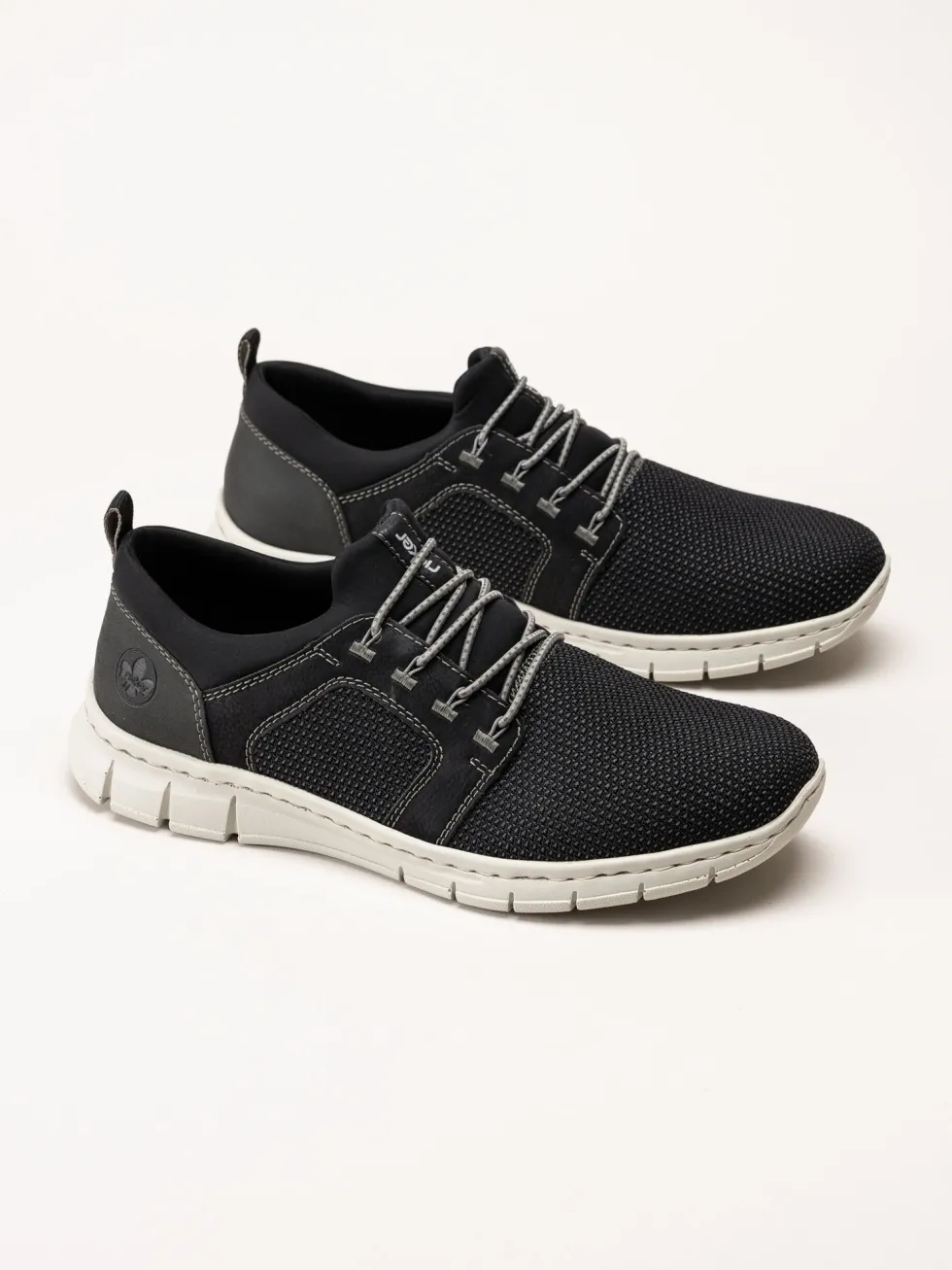 Rieker - Svarta sportiga slip on skor