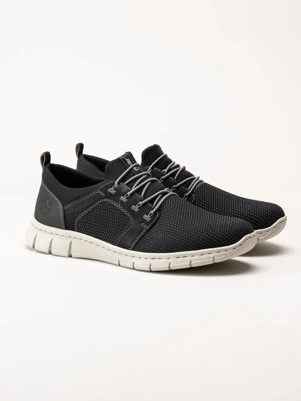 Rieker - Svarta sportiga slip on skor
