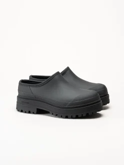 Tretorn - Ari Clog - Svarta slip on skor i naturgummi